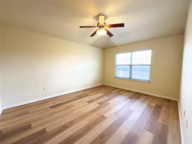 a bathroom with a double vanity sink a mirror and a shower