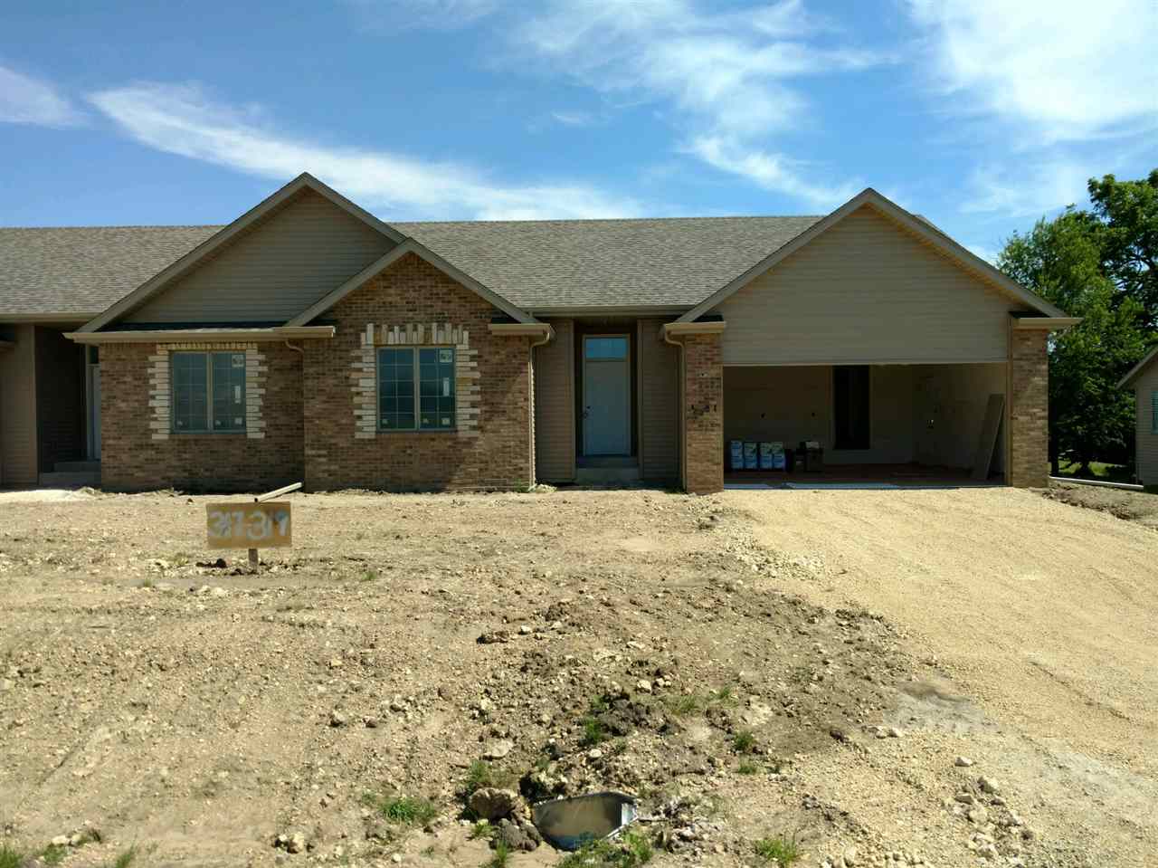 319 East Pershing Road Stillman Valley, IL 61084 - Photo 1 of 7 a front view of a house with a yard