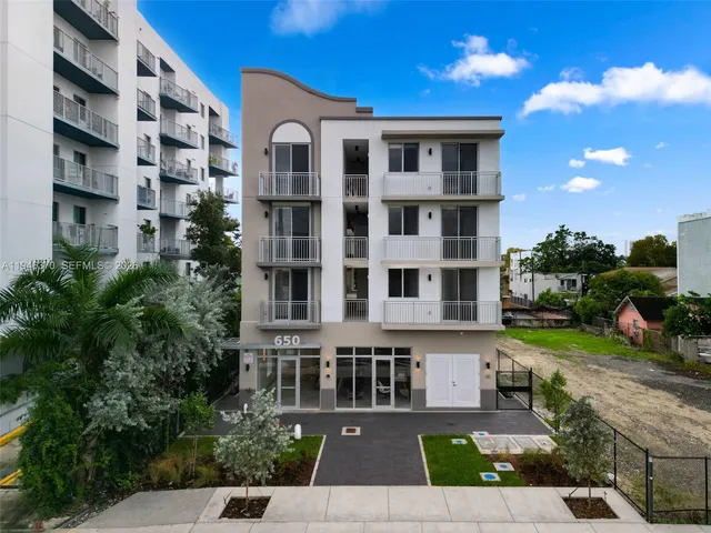 a front view of a building with balcony