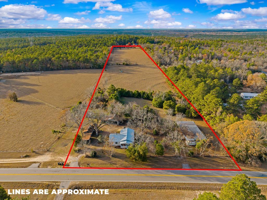 a view of swimming pool with outdoor seating
