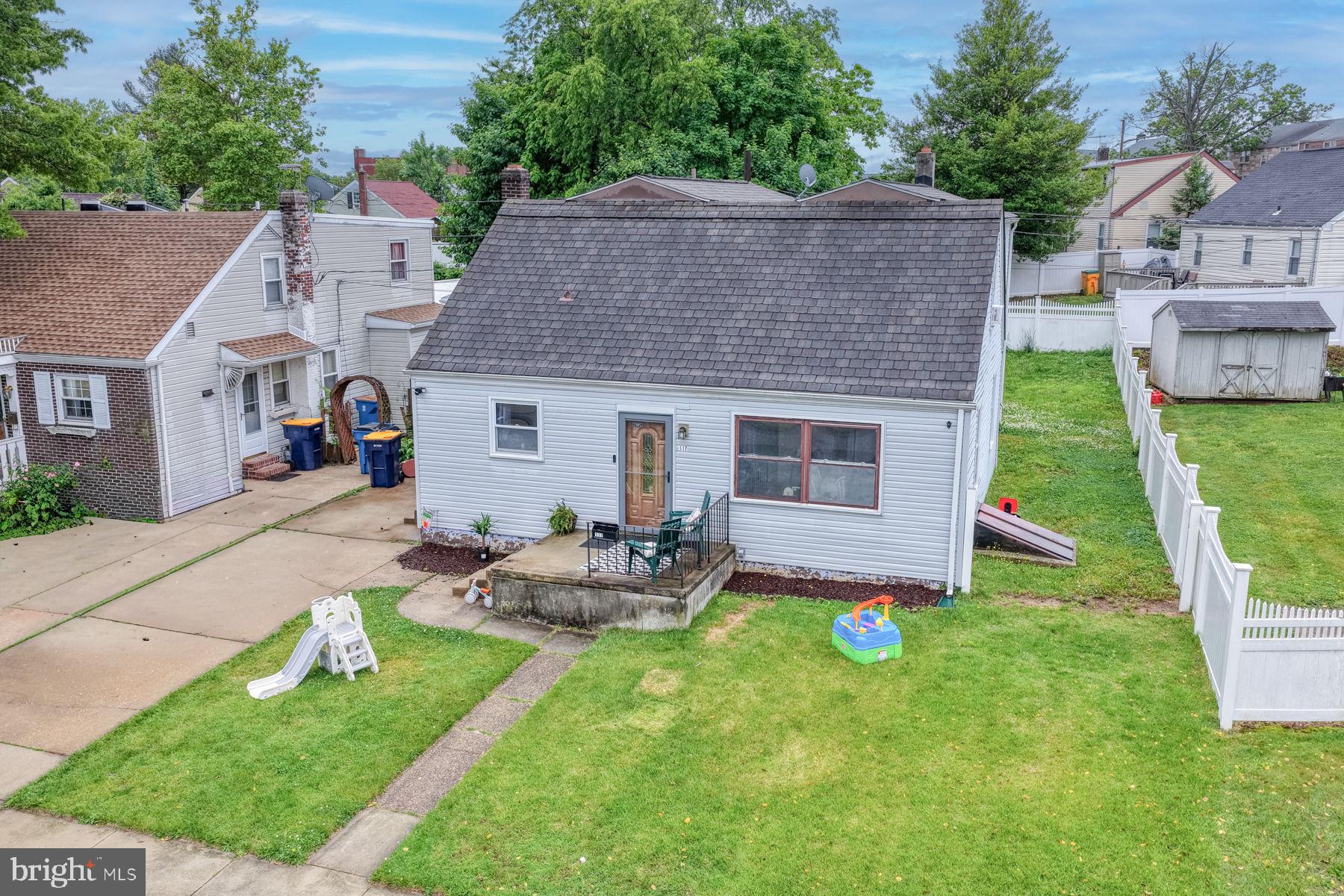 117 Alvil Road Wilmington, DE 19805 - Photo 41 of 41 a aerial view of a house with a yard and sitting area
