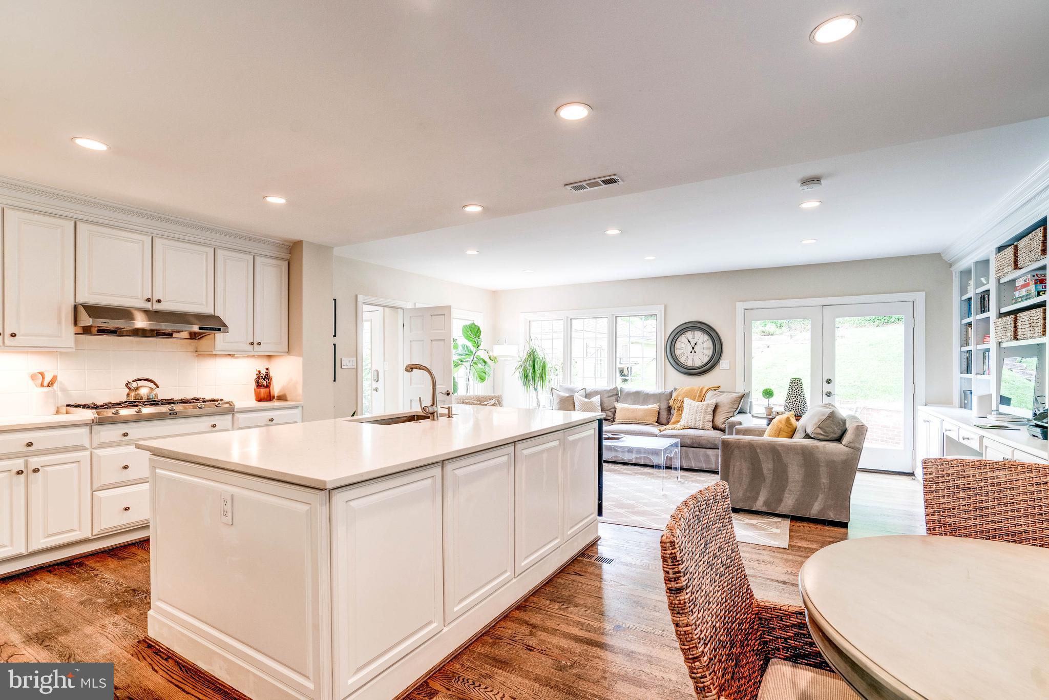 5925 Gloster Road Bethesda, MD 20816 - Photo 12 of 71 Renovated kitchen open to the family room.