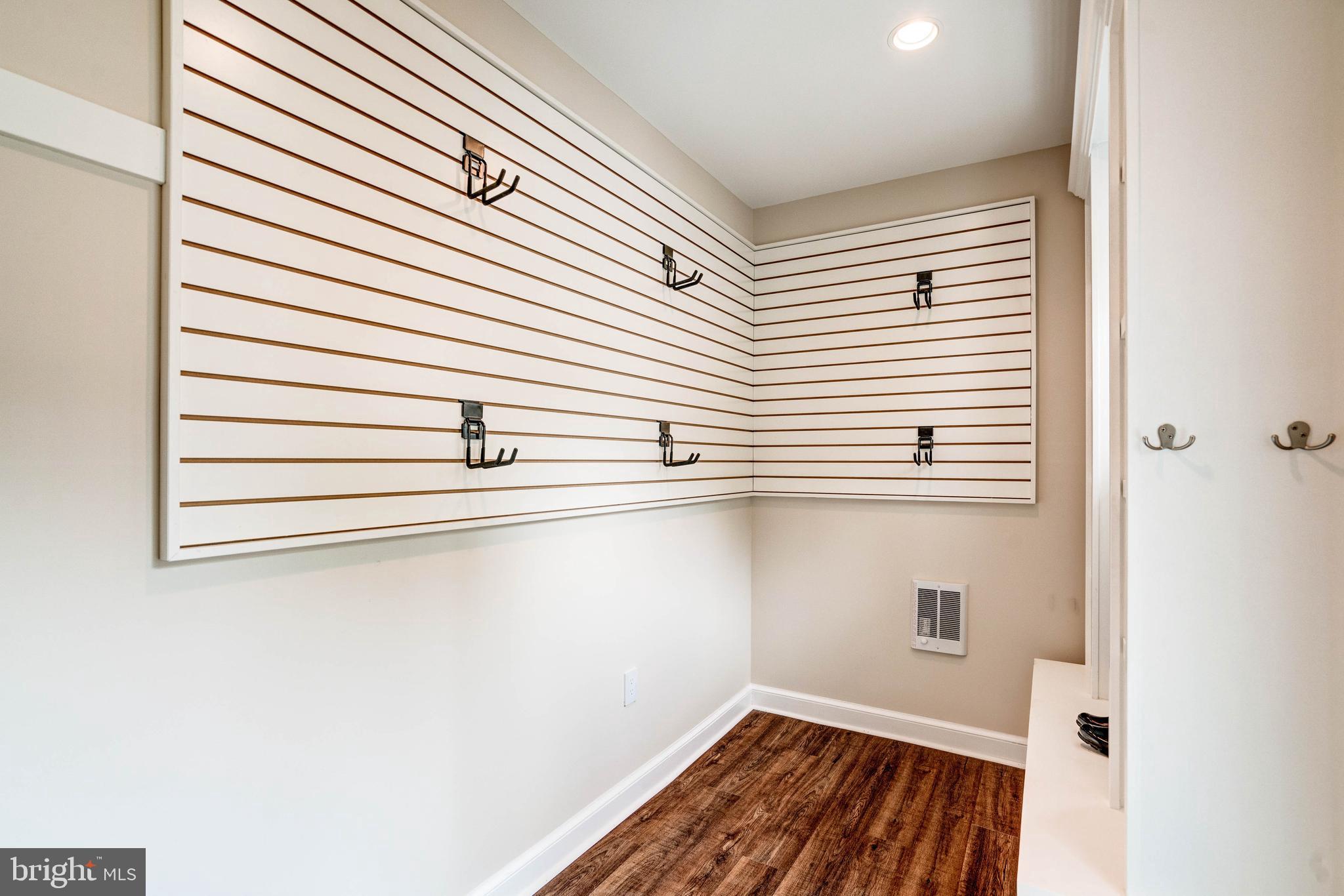 5925 Gloster Road Bethesda, MD 20816 - Photo 31 of 71 Mud room with hook system and shelving.
