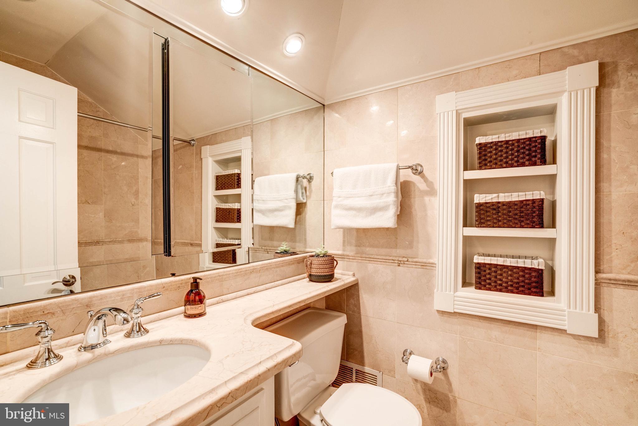5925 Gloster Road Bethesda, MD 20816 - Photo 36 of 71 Renovated hall bath with bathtub.