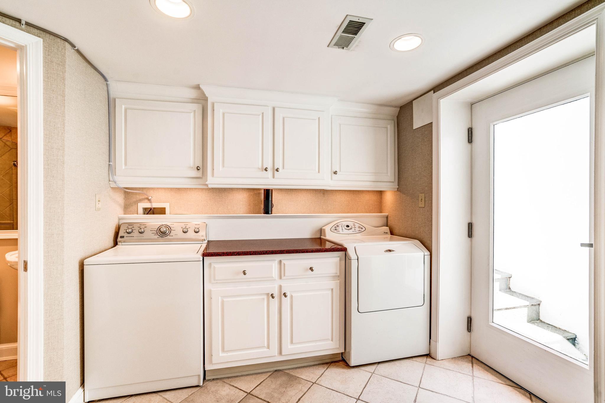 5925 Gloster Road Bethesda, MD 20816 - Photo 53 of 71 Lower level laundry with outside access.