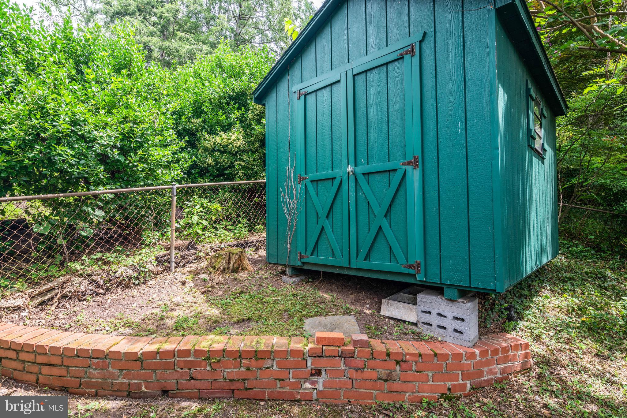 5925 Gloster Road Bethesda, MD 20816 - Photo 69 of 71 Storage shed for your gardening needs.