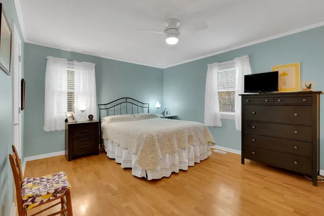 a room with a desk and a window