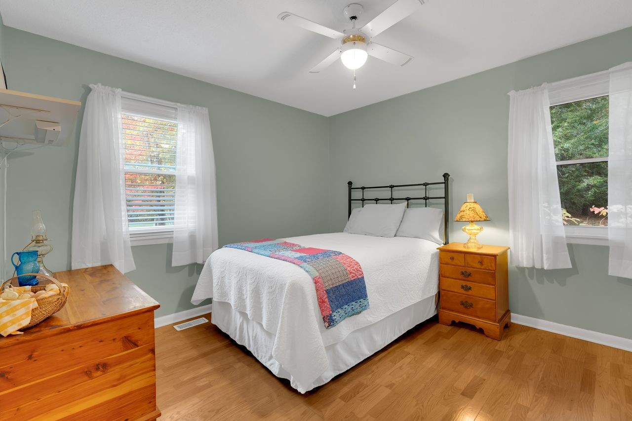 3711 Jumpoff Road Sewanee, TN 37375 - Photo 19 of 57 a bedroom with a bed and window