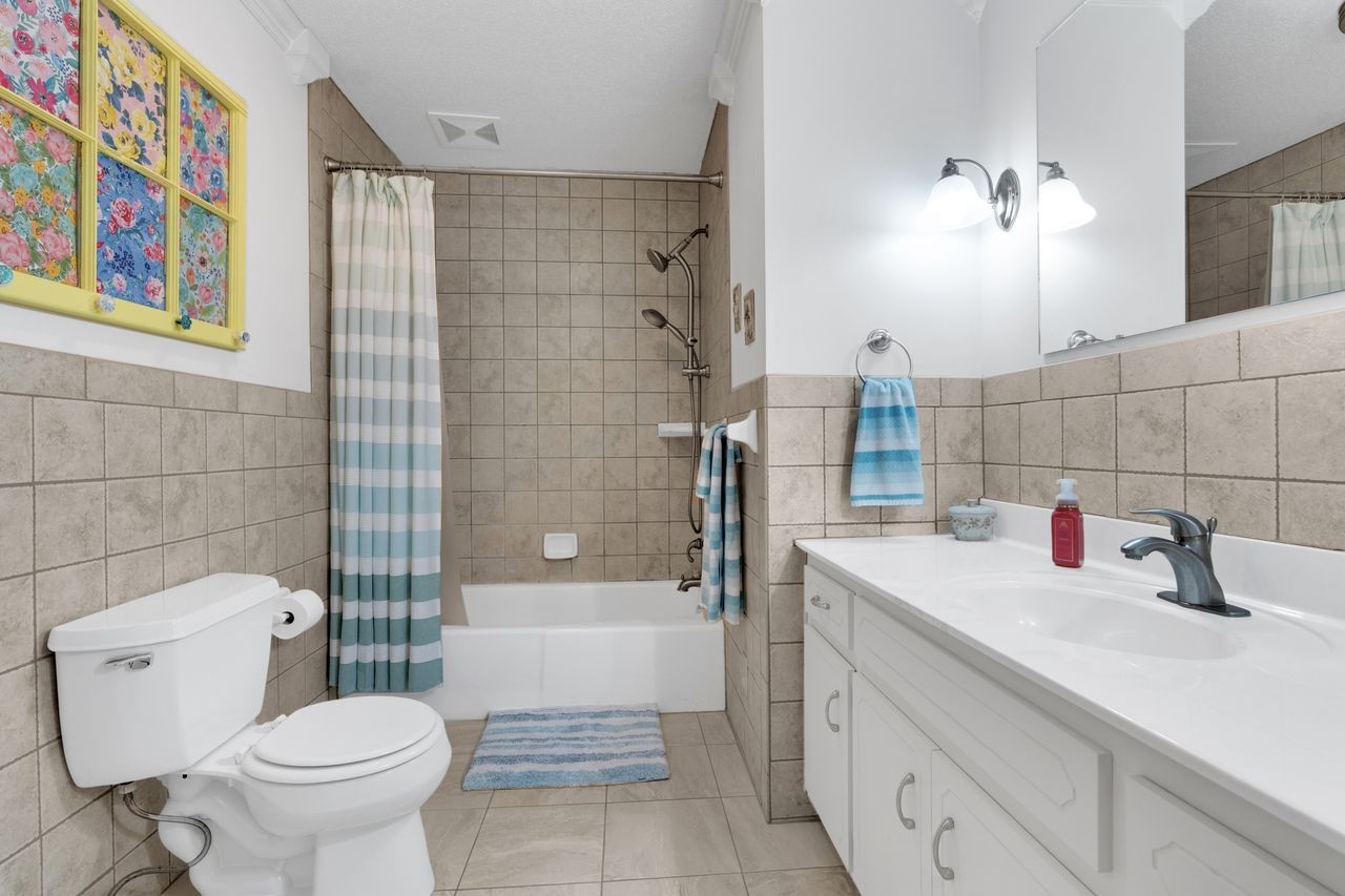 3711 Jumpoff Road Sewanee, TN 37375 - Photo 21 of 57 a bathroom with a sink toilet and shower