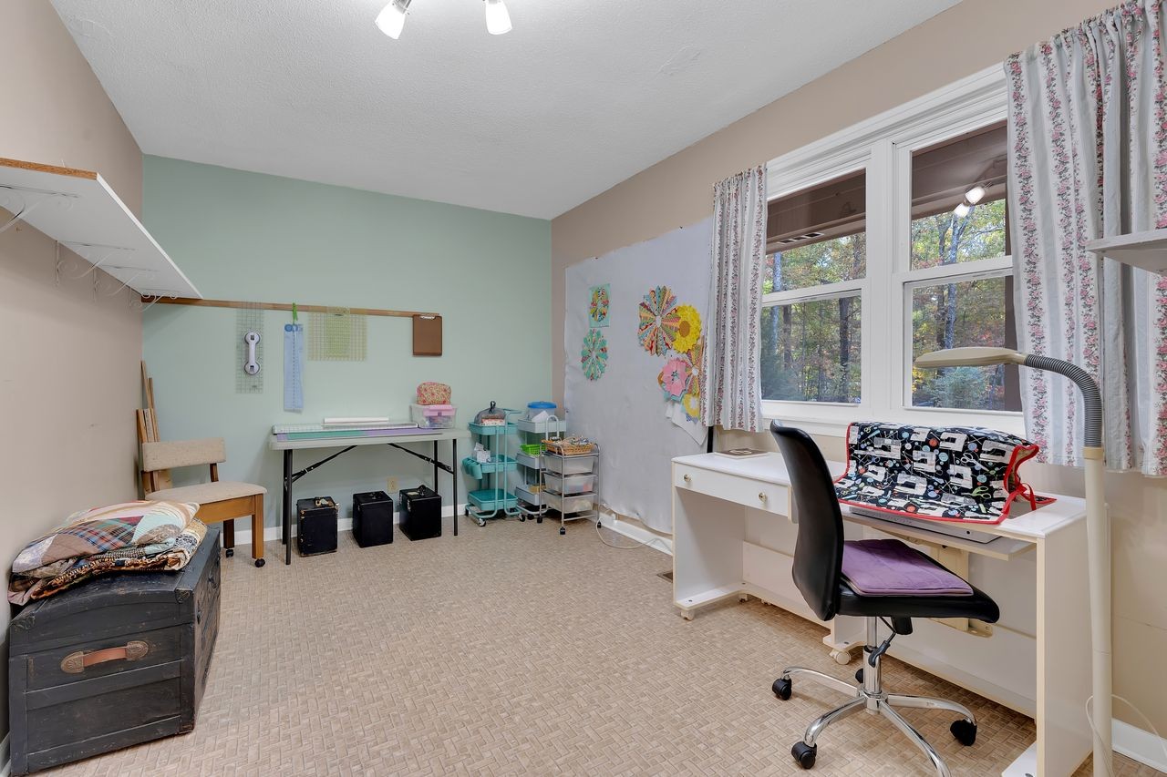 3711 Jumpoff Road Sewanee, TN 37375 - Photo 22 of 57 a bedroom with furniture and a window