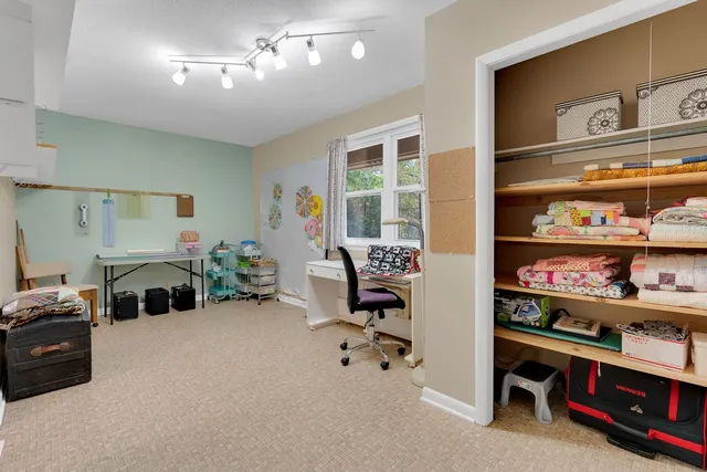 a en suite bathroom with sink and mirror