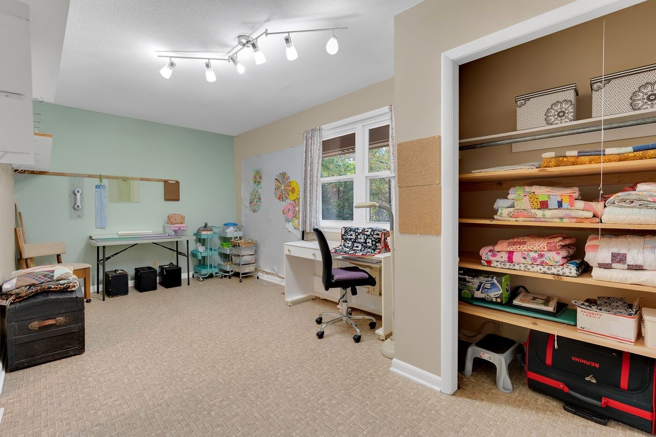 3711 Jumpoff Road Sewanee, TN 37375 - Photo 23 of 57 a view of a livingroom with workspace and a window