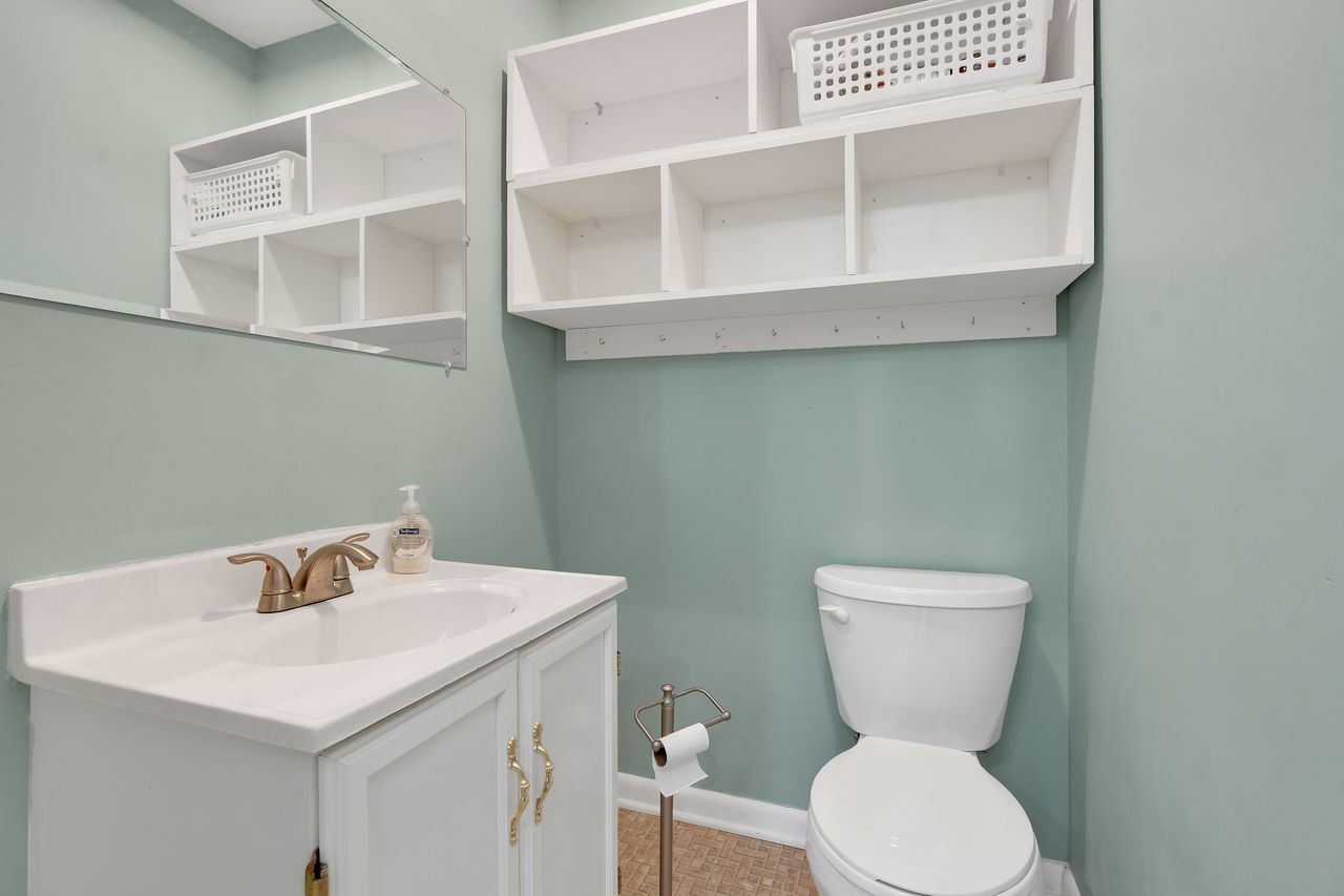 3711 Jumpoff Road Sewanee, TN 37375 - Photo 24 of 57 a bathroom with a toilet sink and mirror