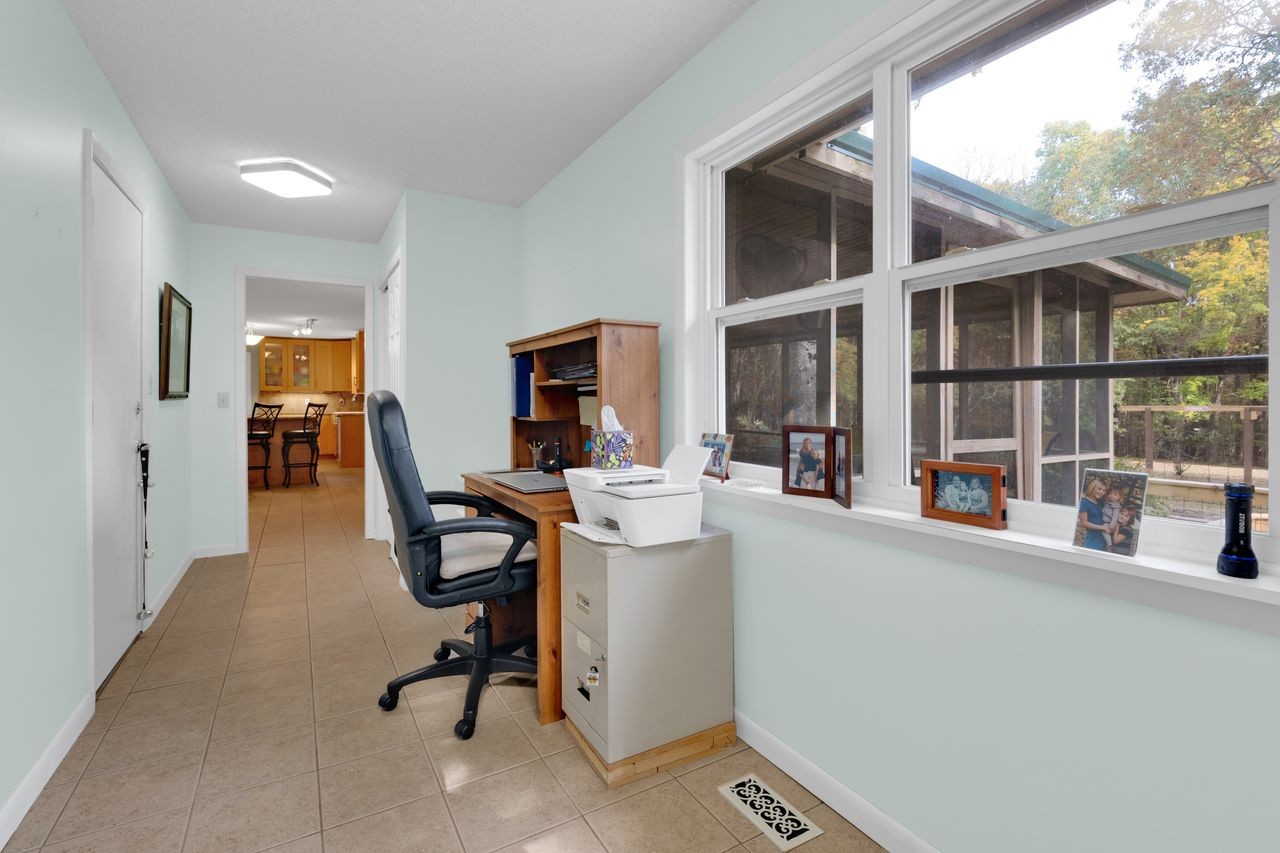 3711 Jumpoff Road Sewanee, TN 37375 - Photo 25 of 57 a view of a workspace with furniture and a window