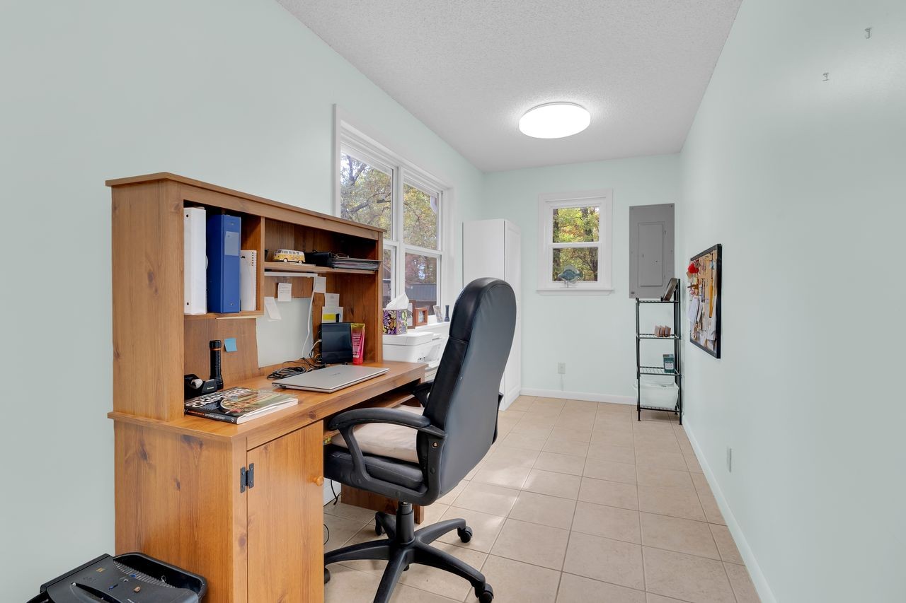 3711 Jumpoff Road Sewanee, TN 37375 - Photo 26 of 57 a work room with furniture and a wooden floor