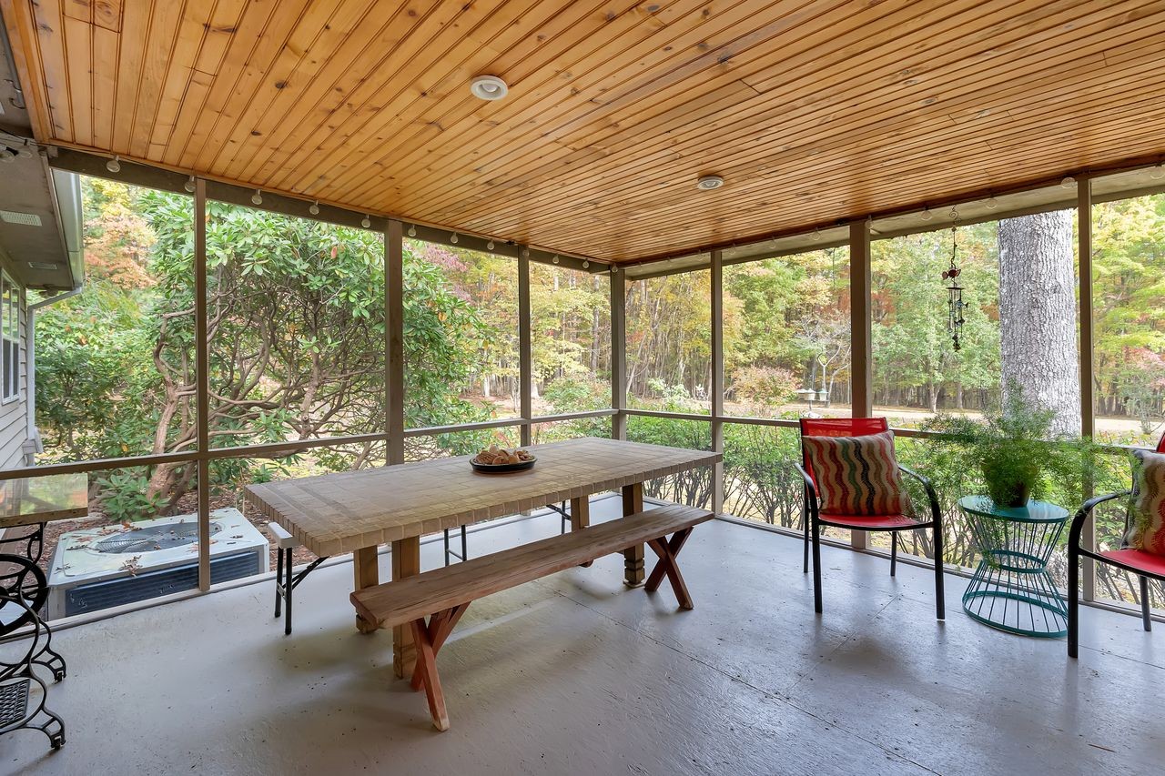 3711 Jumpoff Road Sewanee, TN 37375 - Photo 28 of 57 a room with furniture and a large window