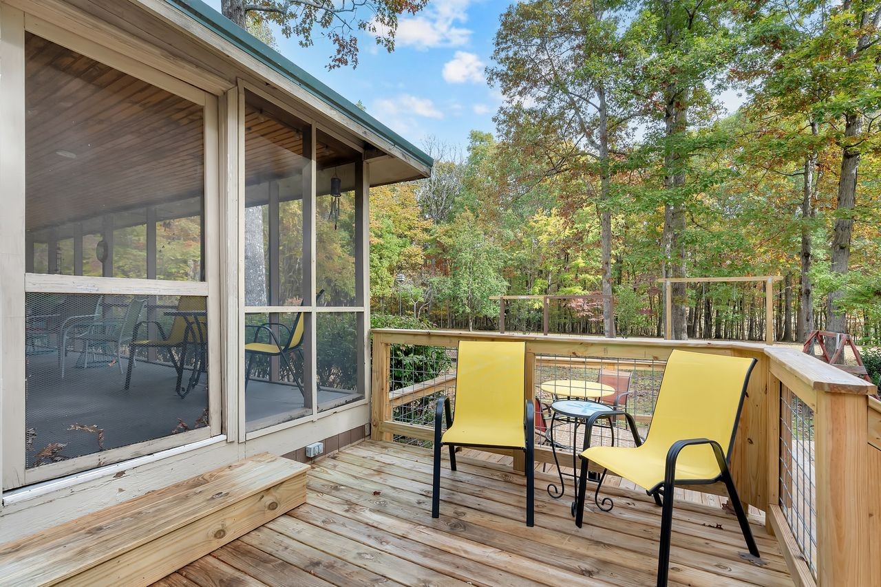 3711 Jumpoff Road Sewanee, TN 37375 - Photo 37 of 57 a view of a chairs and table in the balcony