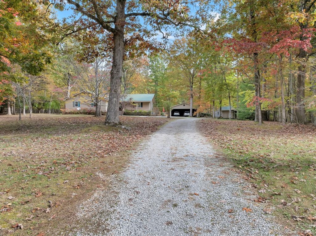 3711 Jumpoff Road Sewanee, TN 37375 - Photo 43 of 57 a view of a yard with trees