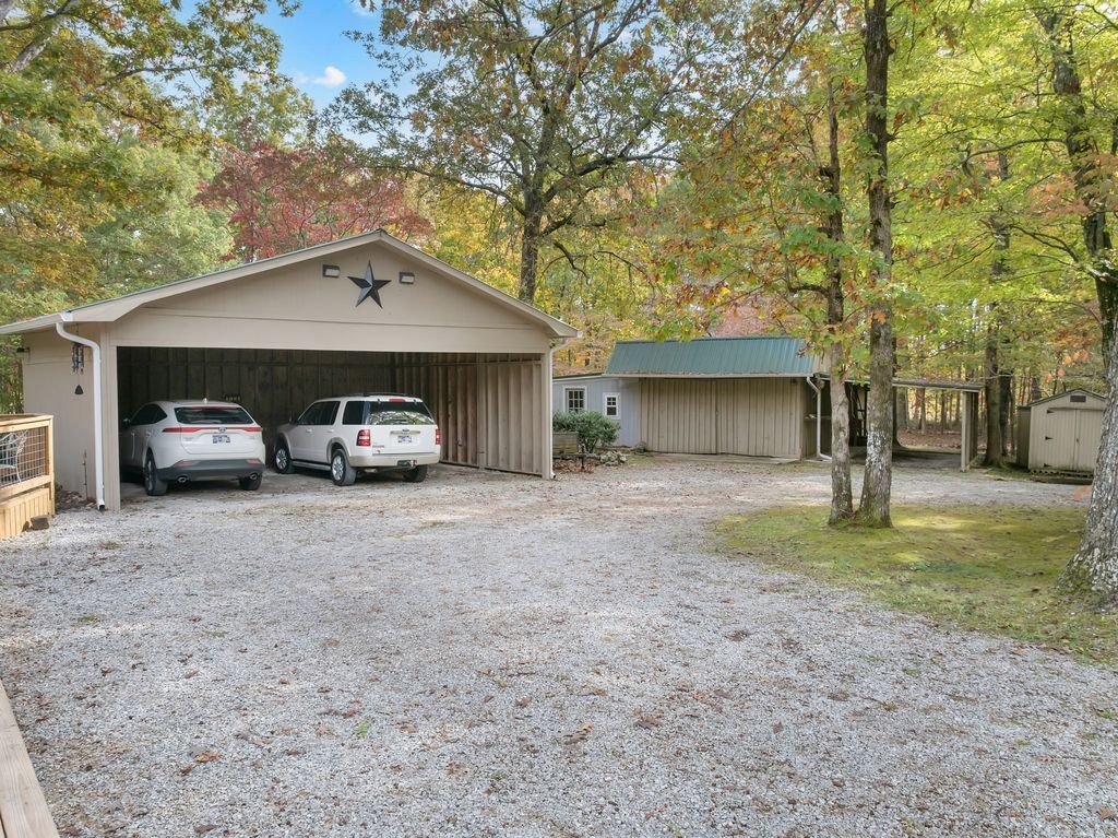3711 Jumpoff Road Sewanee, TN 37375 - Photo 57 of 57 a view of a car parked in front of a house