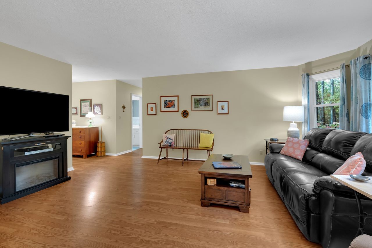 3711 Jumpoff Road Sewanee, TN 37375 - Photo 6 of 57 a living room with furniture and a flat screen tv