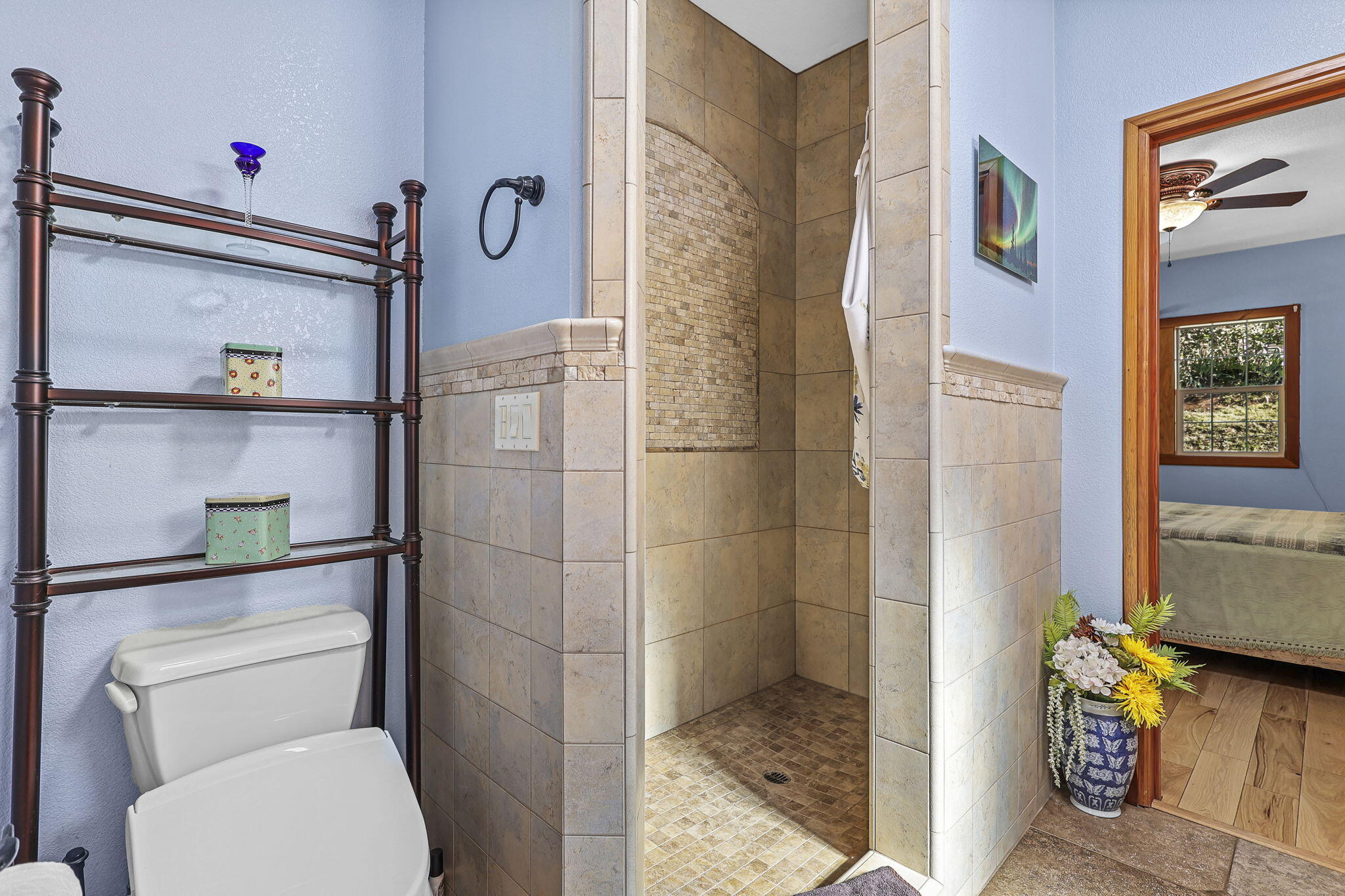 14703 Fern Road Whitmore, CA 96096 - Photo 11 of 48 a bathroom with a toilet and a shower