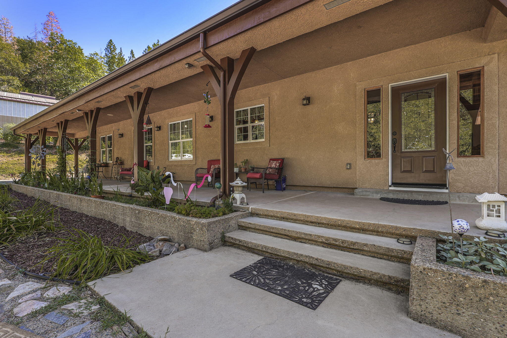 14703 Fern Road Whitmore, CA 96096 - Photo 27 of 48 a front view of a house with plants