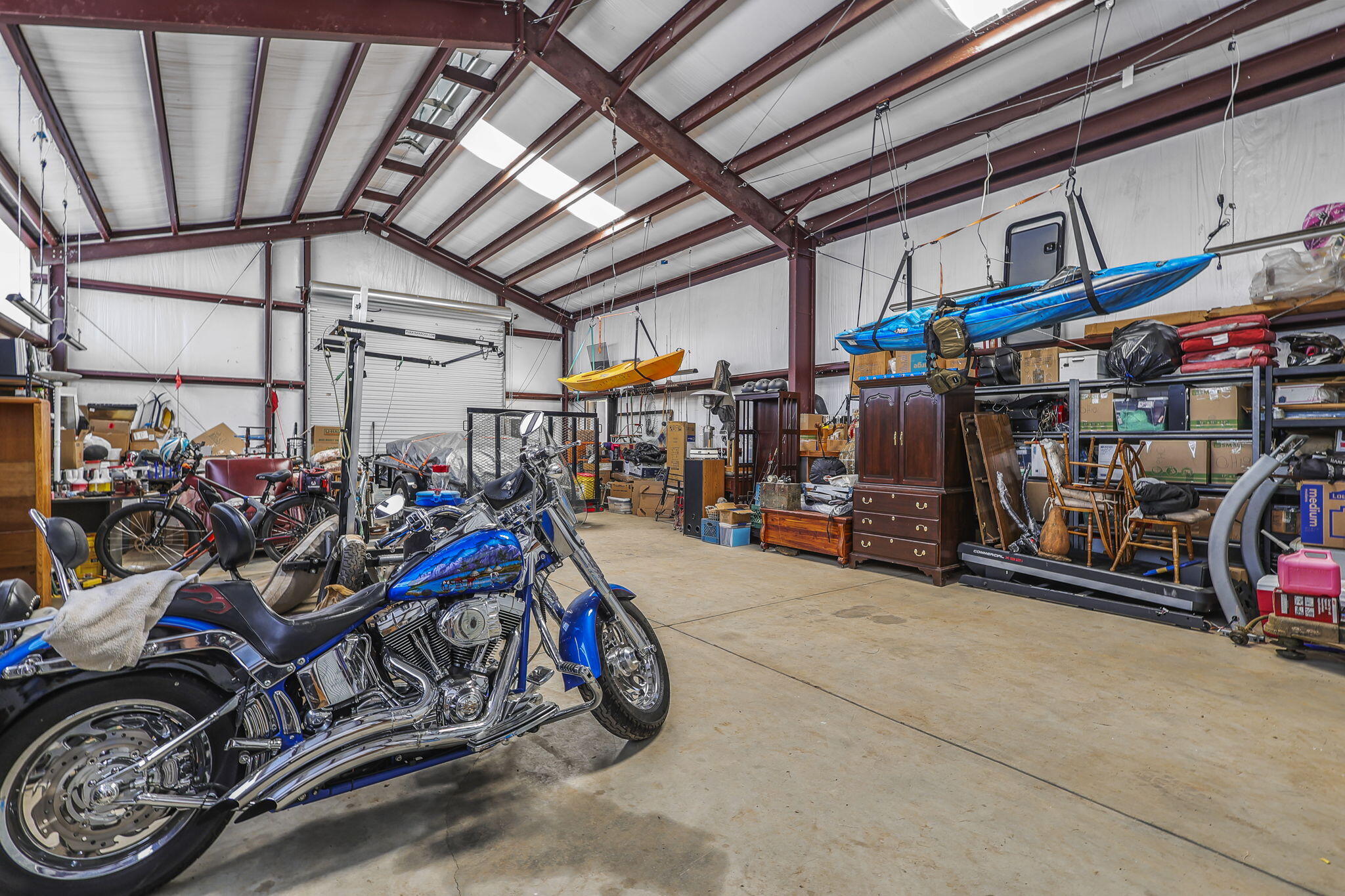 14703 Fern Road Whitmore, CA 96096 - Photo 35 of 48 a view of a storage room with a lot of people