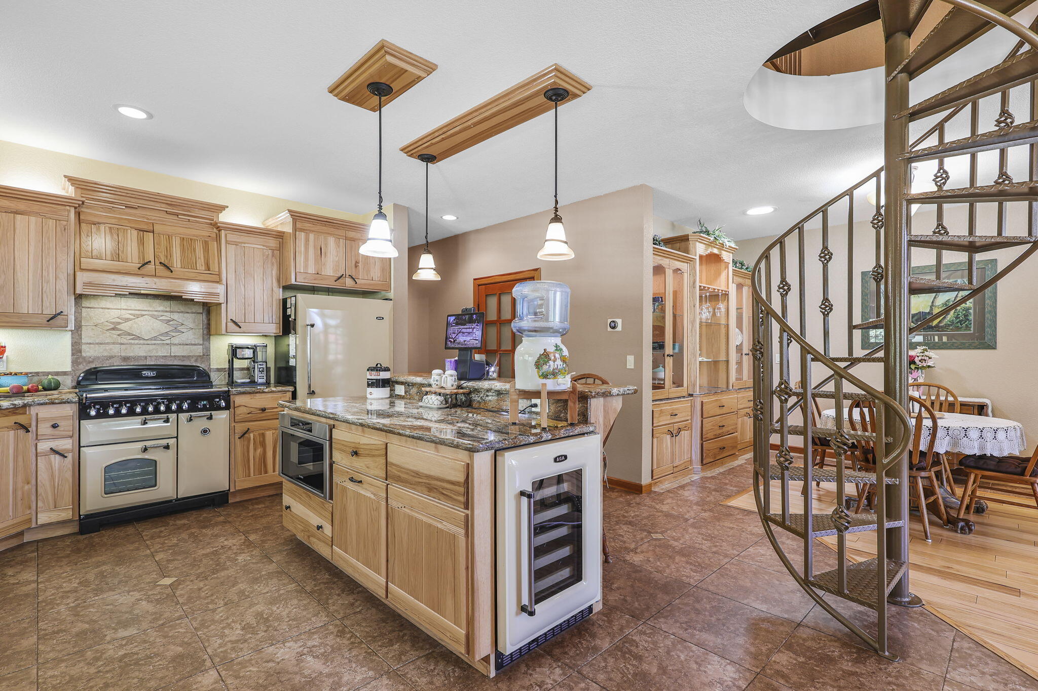 14703 Fern Road Whitmore, CA 96096 - Photo 4 of 48 a kitchen with stainless steel appliances granite countertop a stove and a refrigerator