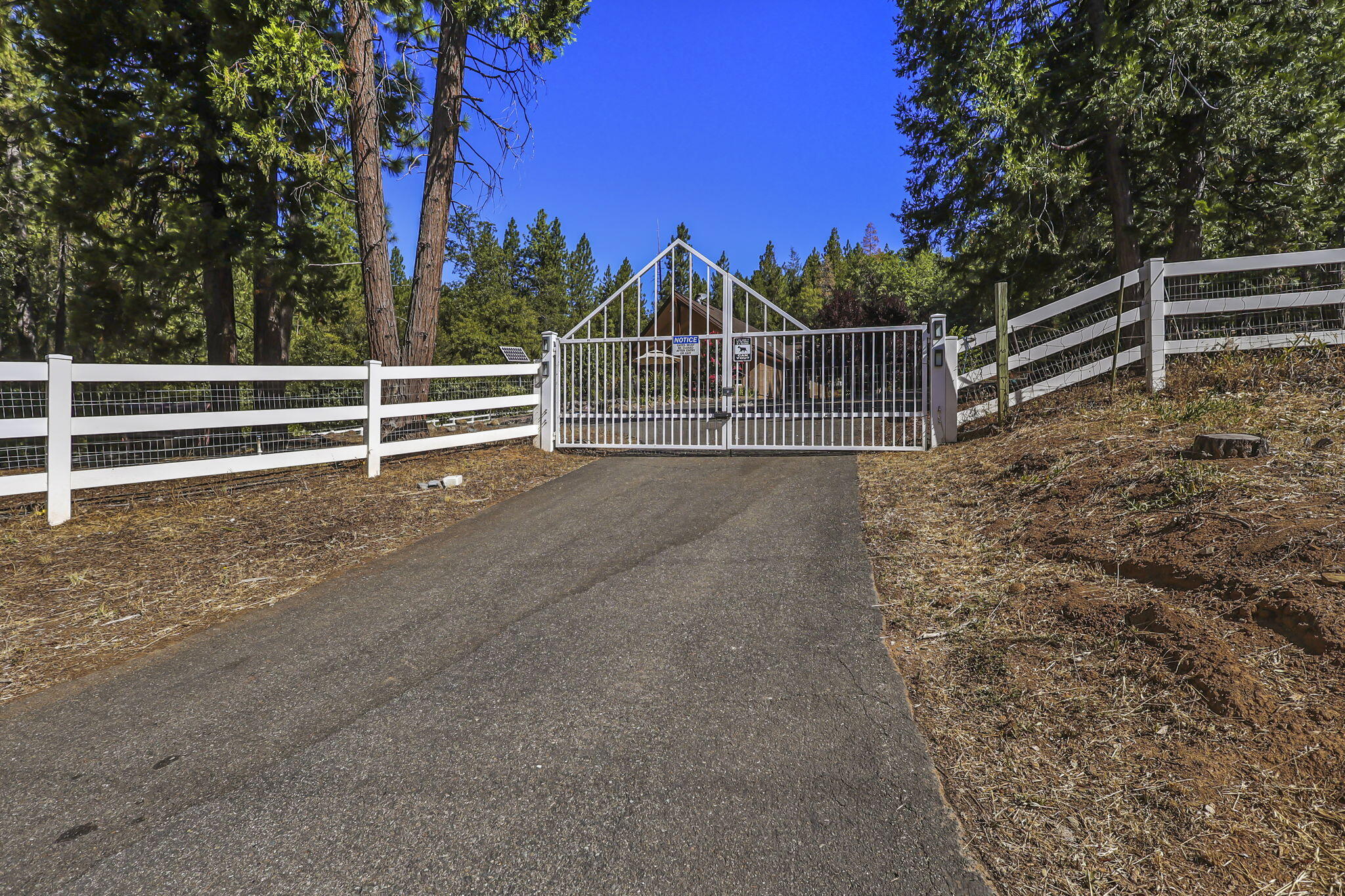 14703 Fern Road Whitmore, CA 96096 - Photo 48 of 48 a view of a fence with a small yard
