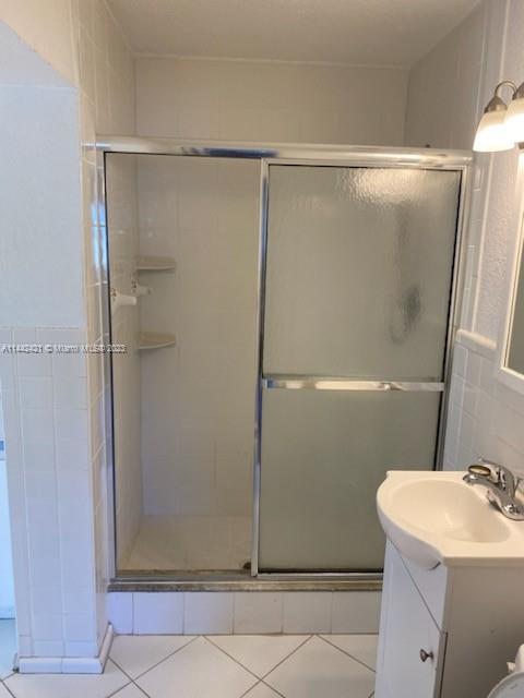 2060 Northeast 26th Street Lighthouse Point, FL 33064 - Photo 20 of 24 a bathroom with a shower