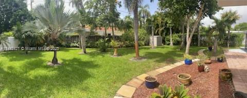 2060 Northeast 26th Street Lighthouse Point, FL 33064 - Photo 2 of 24 a view of yard with green space
