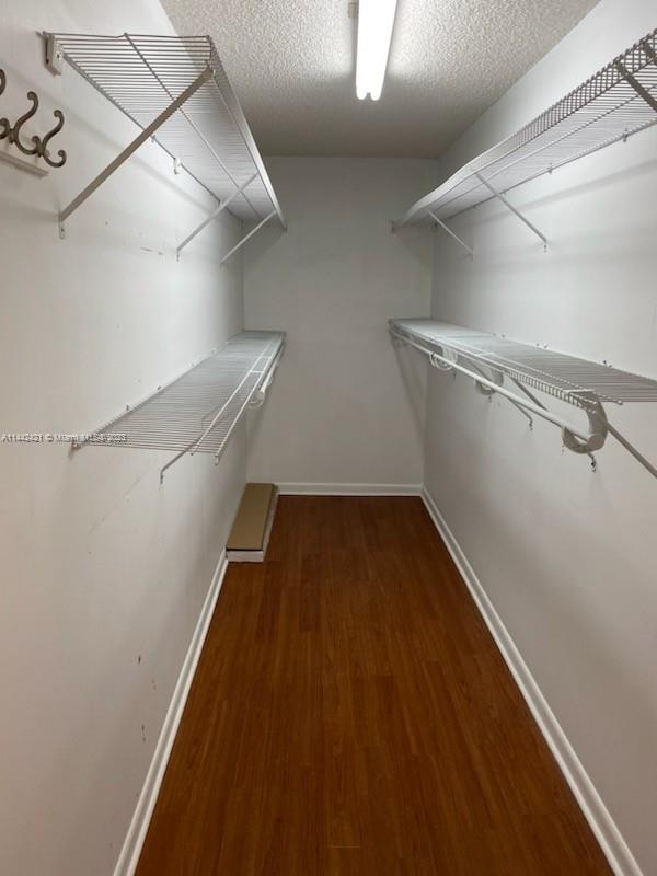 2060 Northeast 26th Street Lighthouse Point, FL 33064 - Photo 21 of 24 a view of a room with racks on the wall