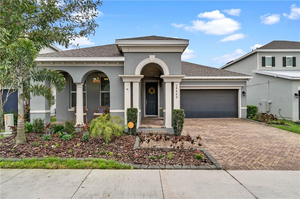 14669 Magnolia Ridge Loop Winter Garden, FL 34787 - Photo 1 of 1 a front view of a house