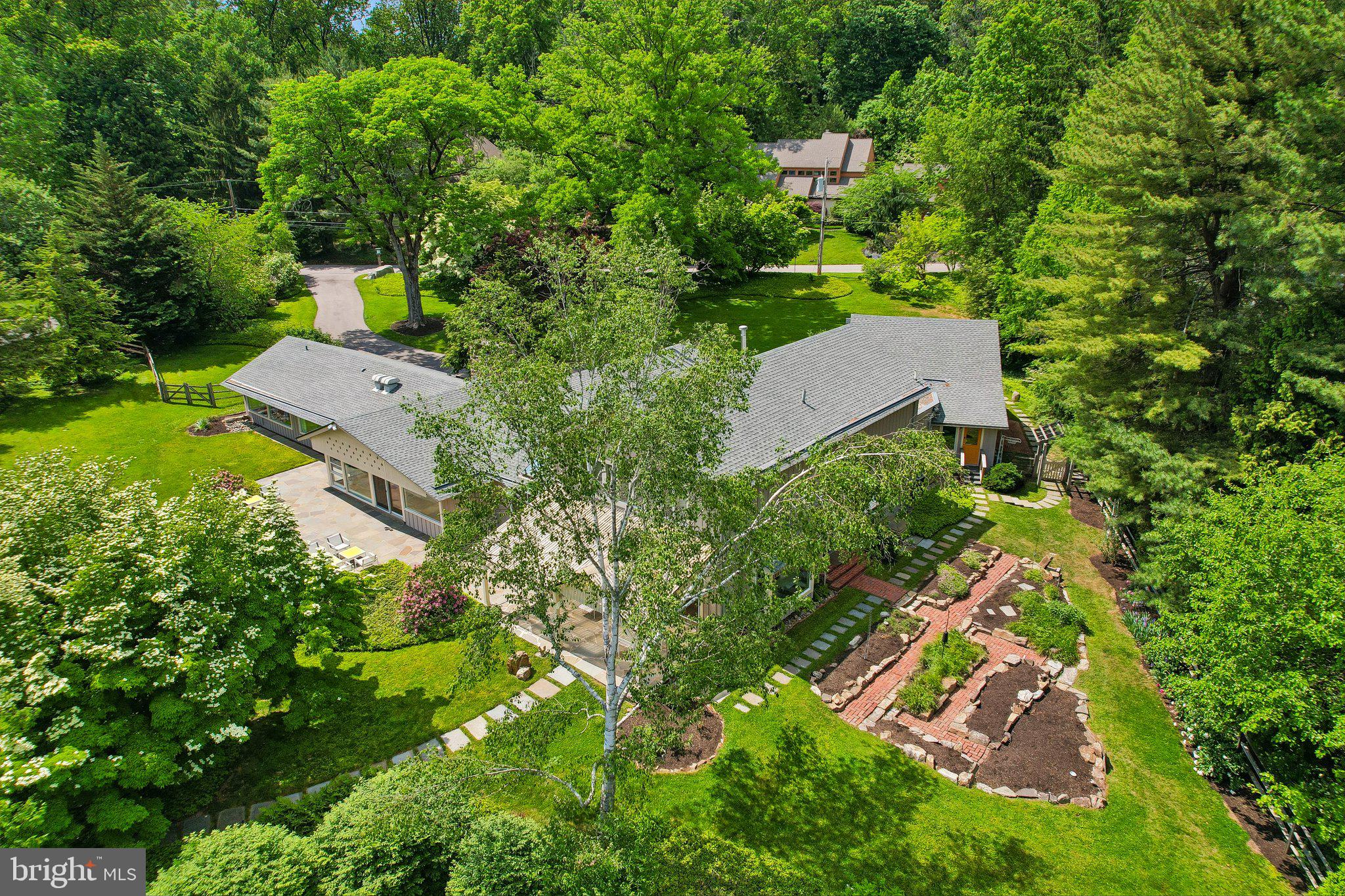 1673 Paper Mill Road Jenkintown, PA 19046 - Photo 57 of 73 an aerial view of residential house with outdoor space and trees all around