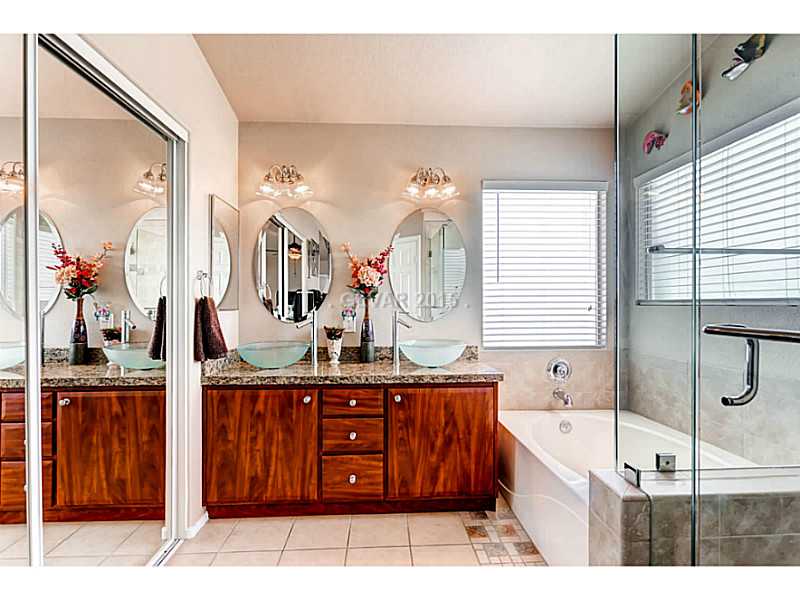 936 Midpride Street Las Vegas, NV 89144 - Photo 20 of 33 Master Bath/Spa. Nicely updated Master Bath with vessel sinks and granite