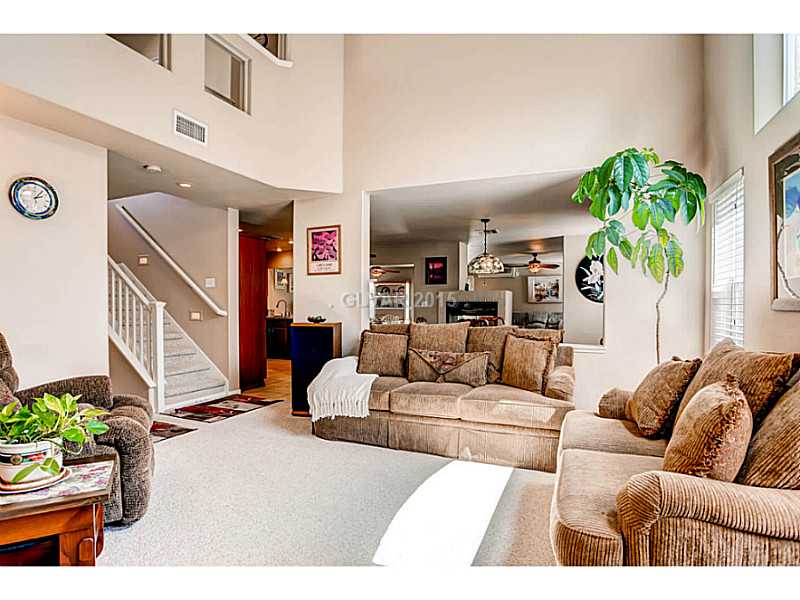 936 Midpride Street Las Vegas, NV 89144 - Photo 2 of 33 Living Room. 24 vaulted ceilings