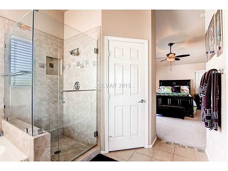 936 Midpride Street Las Vegas, NV 89144 - Photo 21 of 33 Master Bath/Spa. Clear frameless glass shower