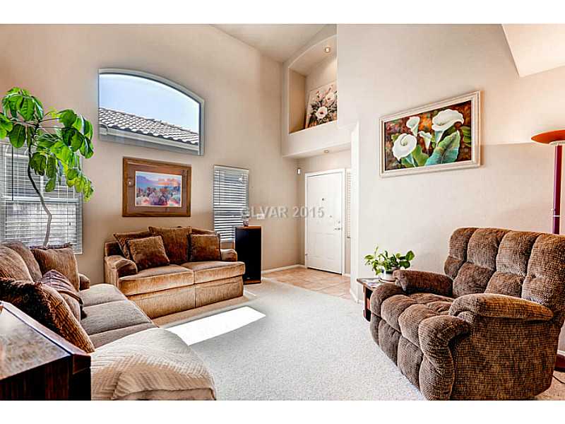 936 Midpride Street Las Vegas, NV 89144 - Photo 4 of 33 Living Room.