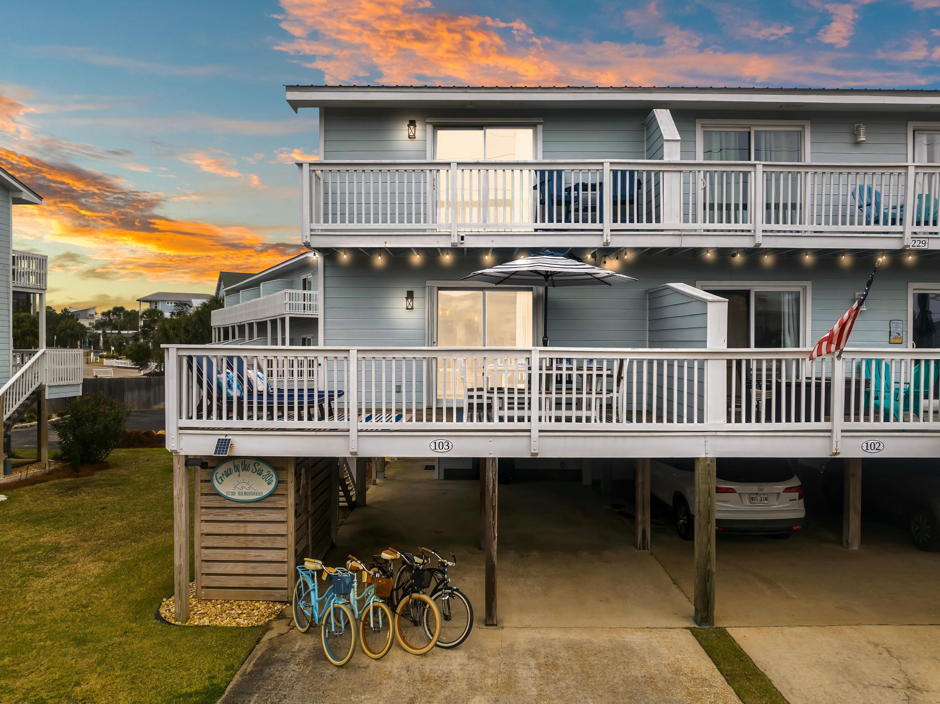 229 Blue Mountain Road, Unit 103 Santa Rosa Beach, FL 32459 - Photo 1 of 50 a view of a house with a deck