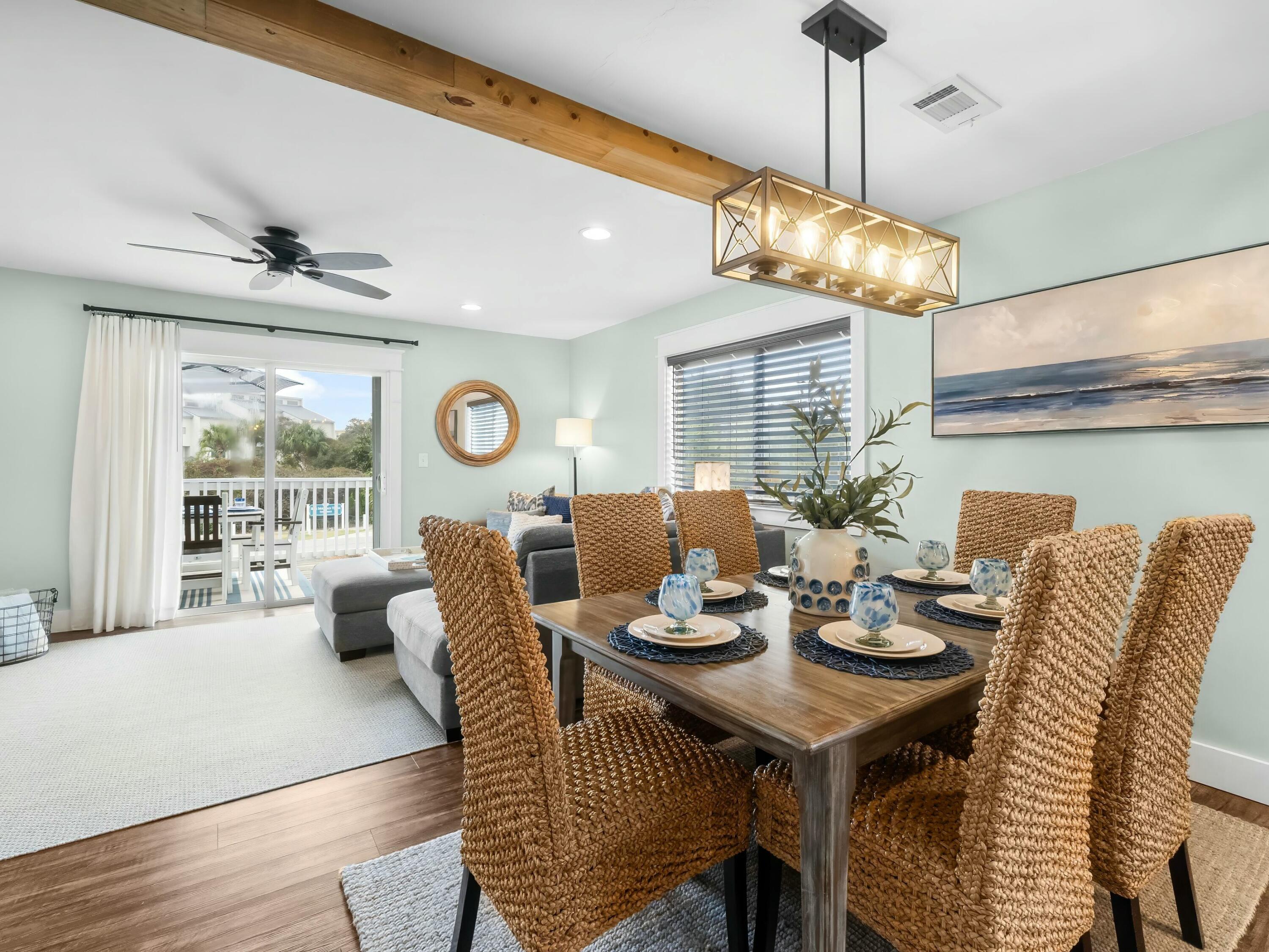 229 Blue Mountain Road, Unit 103 Santa Rosa Beach, FL 32459 - Photo 15 of 50 a view of a dining room with furniture window and outside view