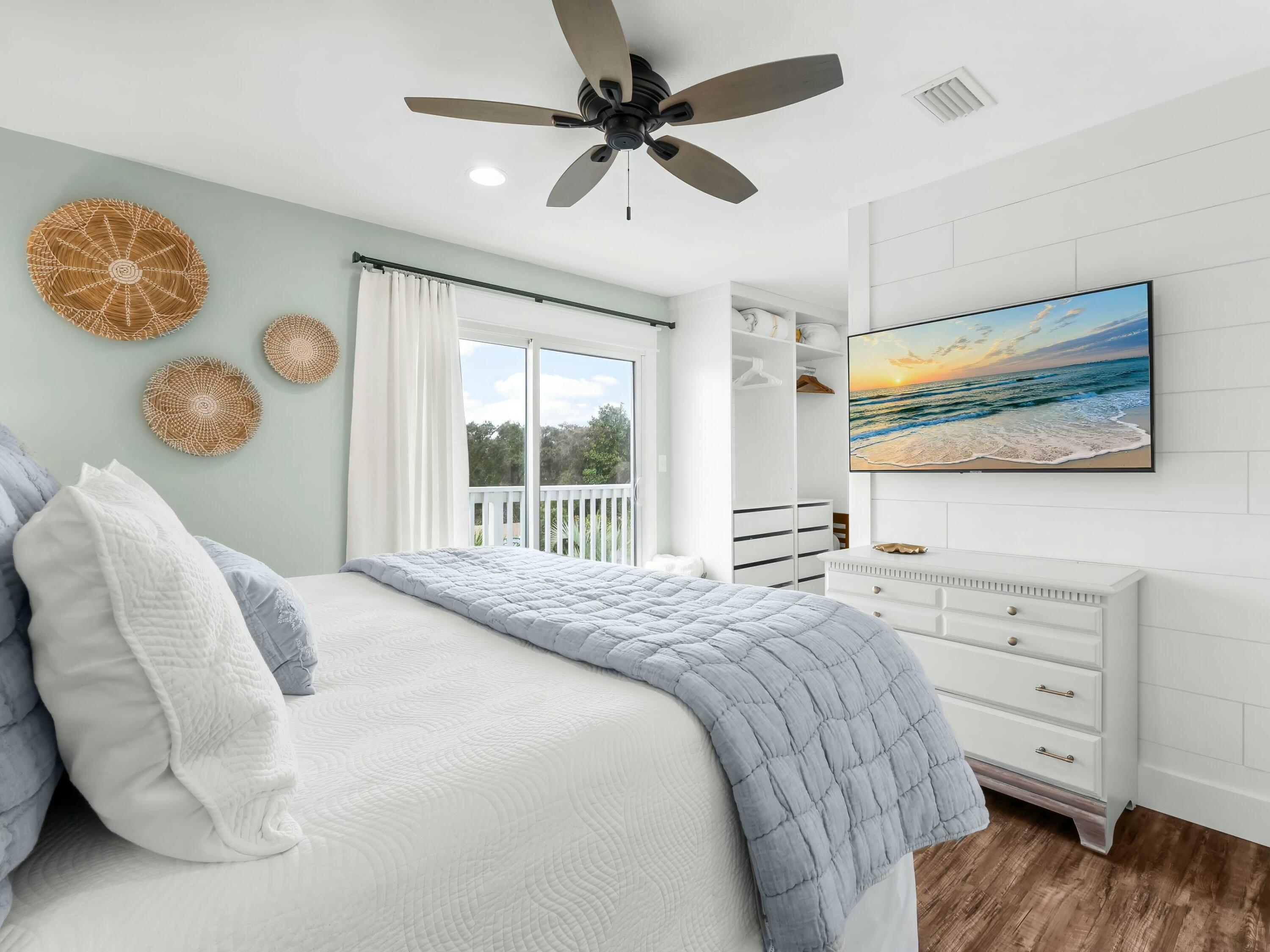229 Blue Mountain Road, Unit 103 Santa Rosa Beach, FL 32459 - Photo 29 of 50 a bedroom with a bed and a window