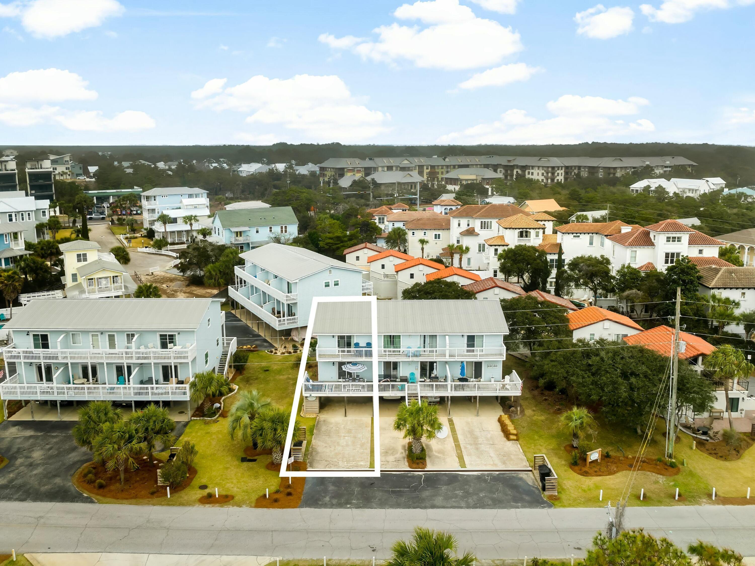 229 Blue Mountain Road, Unit 103 Santa Rosa Beach, FL 32459 - Photo 36 of 50 a view of a city with an ocean view