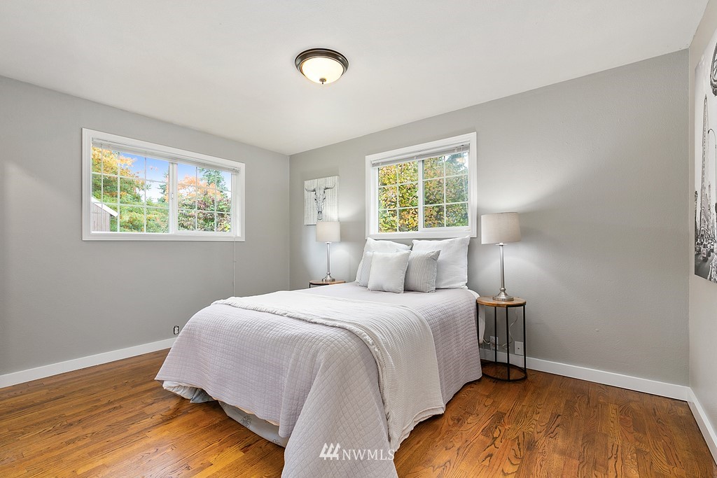 631 219th Place Southwest Bothell, WA 98021 - Photo 11 of 21 a bedroom with a bed and a window