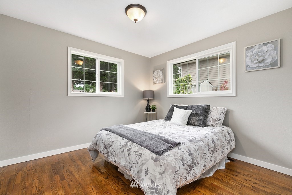 631 219th Place Southwest Bothell, WA 98021 - Photo 13 of 21 a bedroom with a bed and a window