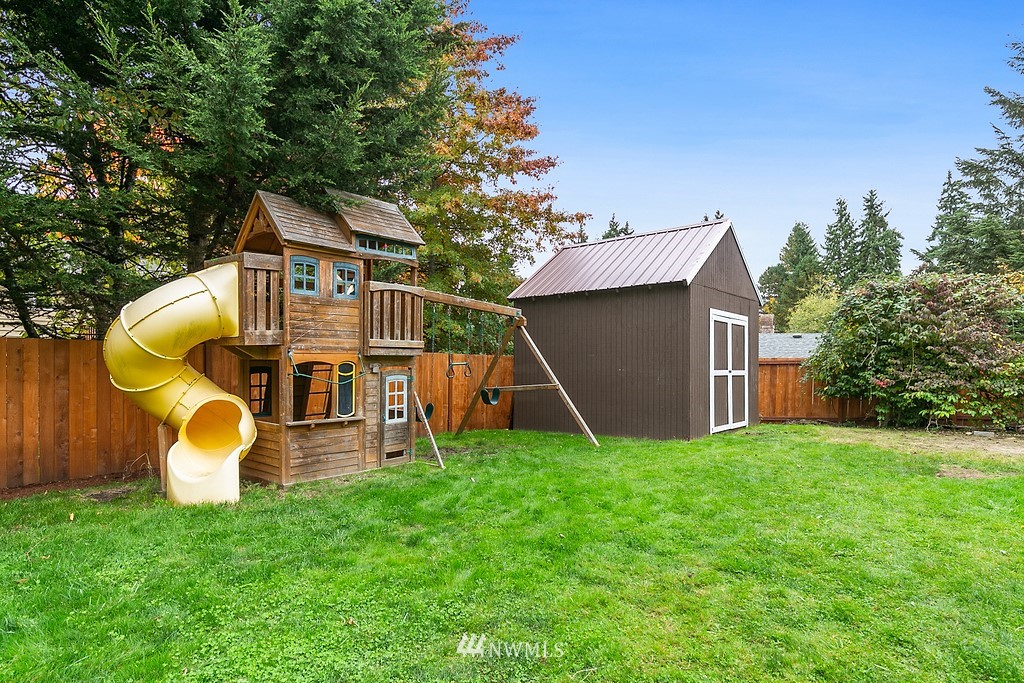 631 219th Place Southwest Bothell, WA 98021 - Photo 16 of 21 a view of a house with a backyard