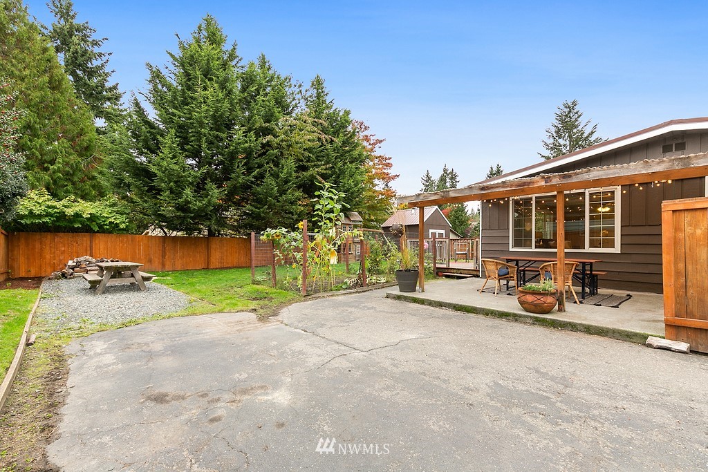 631 219th Place Southwest Bothell, WA 98021 - Photo 19 of 21 a view of a house with backyard and sitting area