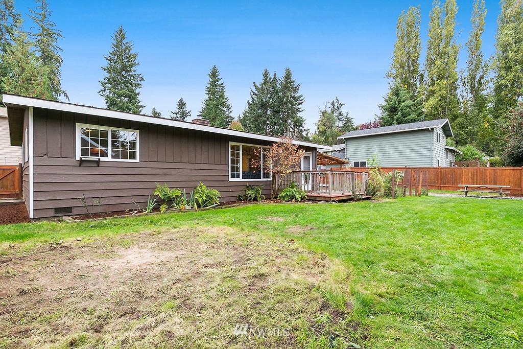 631 219th Place Southwest Bothell, WA 98021 - Photo 20 of 21 a backyard of a house with seating space