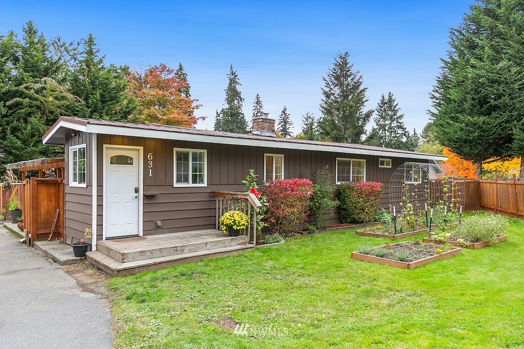 631 219th Place Southwest Bothell, WA 98021 - Photo 21 of 21 a front view of house with yard and green space