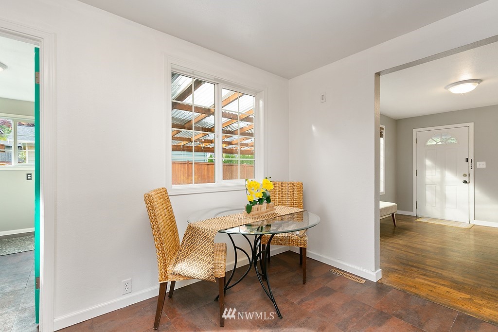631 219th Place Southwest Bothell, WA 98021 - Photo 8 of 21 a view of a dining room with furniture and wooden floor