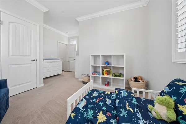 a bed room with a bed and furniture